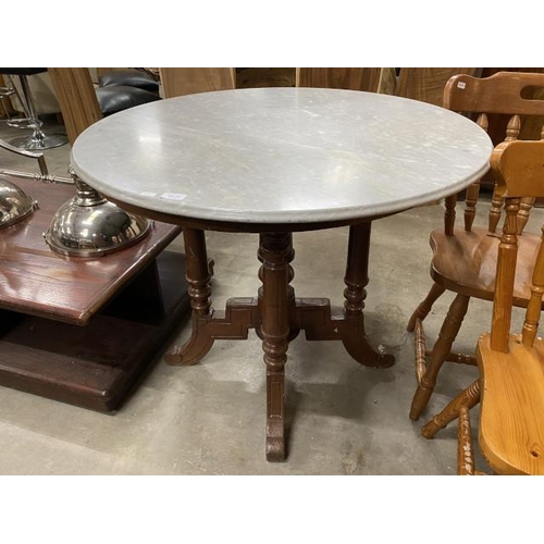 145 - Mahogany based centre table with marble top 77H 91cm diameter