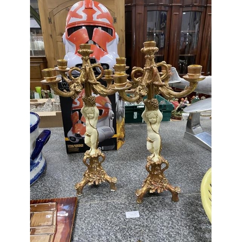 276 - Pair of gilt 4 branch cherub candelabras 47H