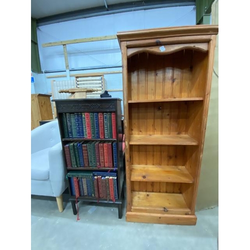 31 - Carved oak bookcase 105H 49W 26D with assorted Readers Digest books and a pine bookcase 142H 60W 25D