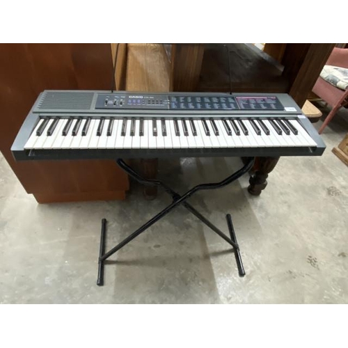 38 - Casio CTK-450 keyboard and stand (no power lead, can be used with batteries)