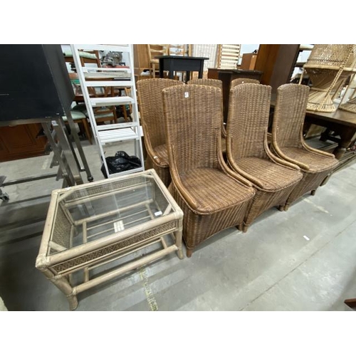 52 - 6 basket weave dining chairs 102H 50W 70D and a rattan coffee table 46H 68W 52D