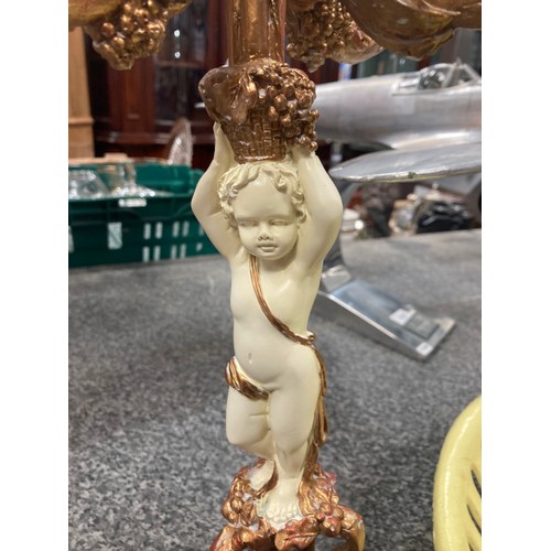 276 - Pair of gilt 4 branch cherub candelabras 47H