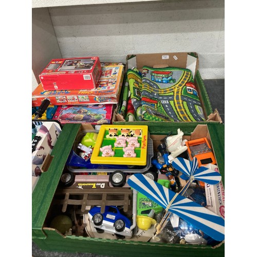 389 - Collection of children's toys inc. 2 car play mats, table top football, puzzles, play worn cars etc.