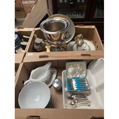 417 - 7 boxes containing silver plated champagne bucket, Kaiser 'Capriccio' cabinet plate, cutlery, toast ... 