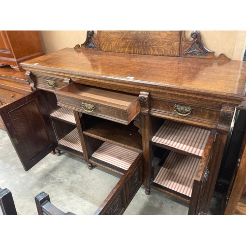 138 - Victorian carved oak sideboard 121H 153W 51D