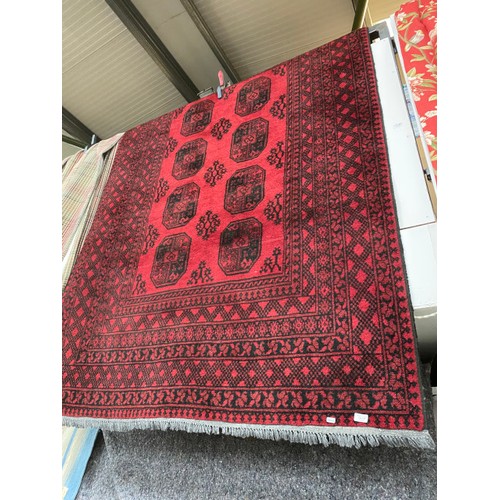 149 - Red ground Persian rug 245 x 165cm