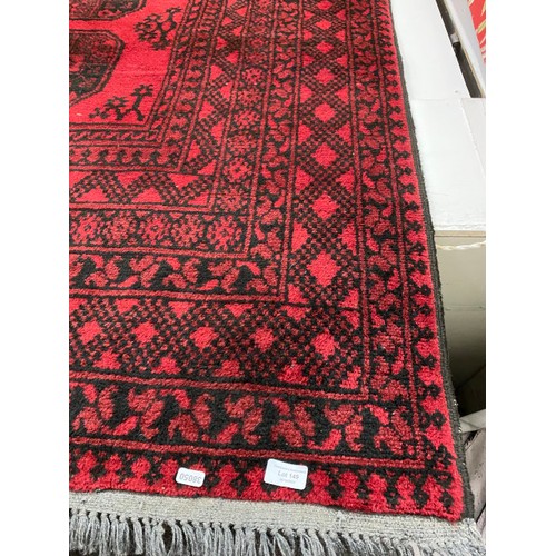 149 - Red ground Persian rug 245 x 165cm