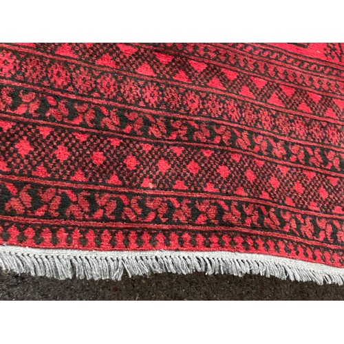 149 - Red ground Persian rug 245 x 165cm