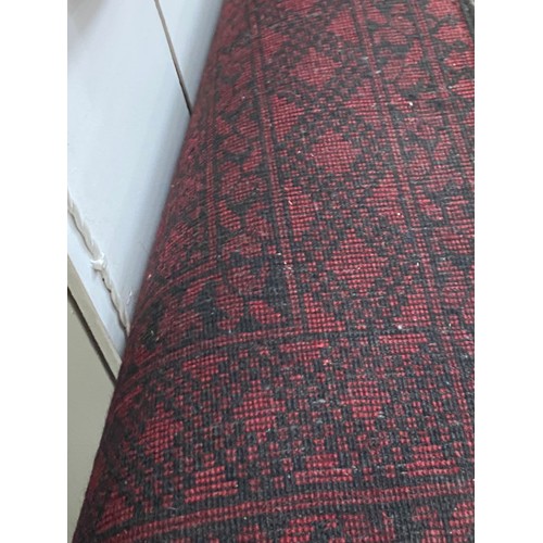 149 - Red ground Persian rug 245 x 165cm