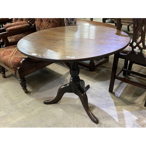 108 - Georgian oak tilt top table 70H 89cm diameter