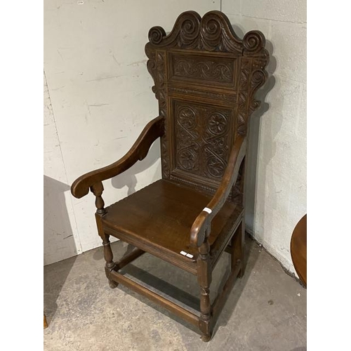 129 - 17th century style carved oak 'Wainscot' armchair 128H 63W 58D