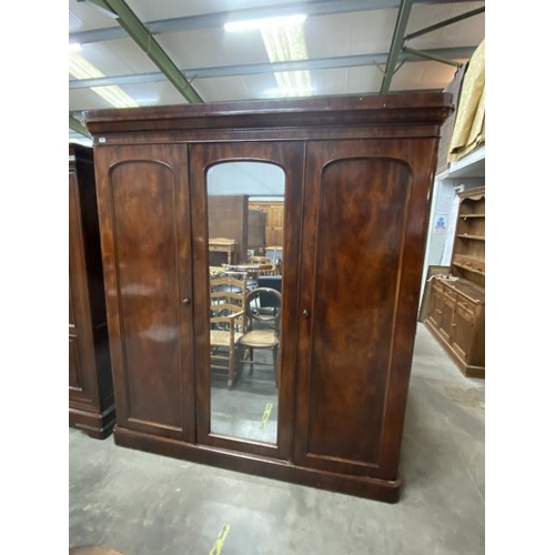 167 - Victorian mahogany triple wardrobe with hanging rail and sliding drawers to the interior 210H 190W 6... 