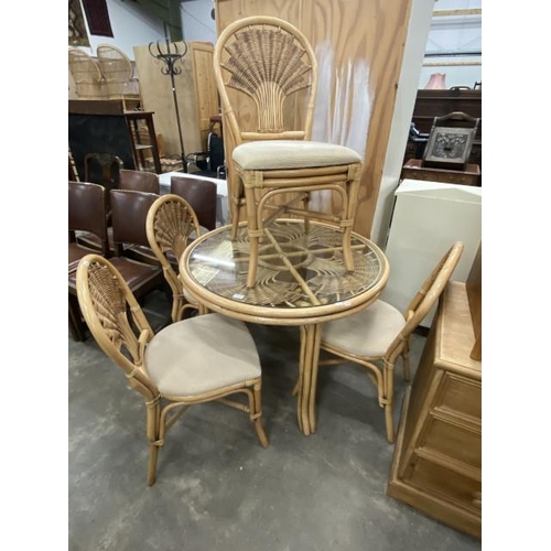 175 - Burdekin rattan table 73H 97cm diameter and 4 chairs