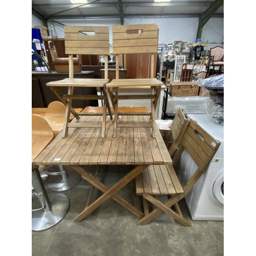 185 - Teak folding garden table 75H 90W 90D and 4 folding chairs