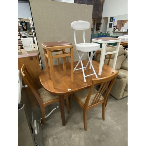 192 - Mid century teak extending dining table 74H 130-175W 91D with 4 matching chairs and 3 vintage stools