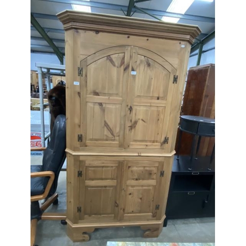 259 - Pine 4 door corner cupboard 200H 110W 61D with shelves to the interior