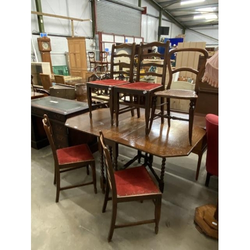 26 - Oak barley twist drop leaf table 76H 30-155W 91D with 4 oak ladderback chairs and one other