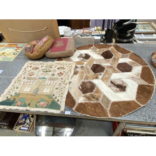 265 - Unframed sampler 'Elizabeth Bottomley her work aged 8, 1836' 56x60cm, circular cowhide patchwork rug... 