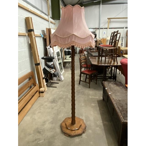 27 - Carved oak standard lamp and shade 148H