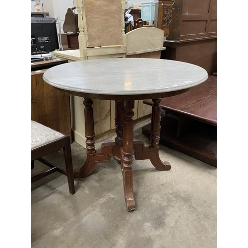 47 - Mahogany based centre table with marble top 77H 91cm diameter