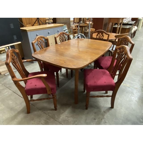 53 - G Plan extending dining table 74H 148-194W 98D and 6 pine Ducal chairs including 2 carvers