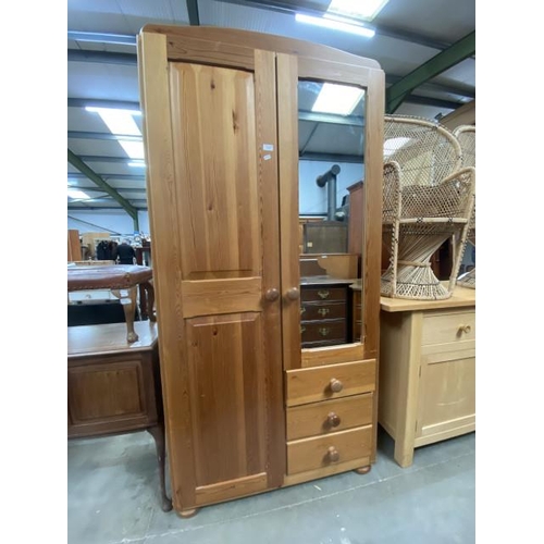 79 - Pine 2 door/3 drawer wardrobe with hanging rail and shelves to the interior 205H 100W 54D