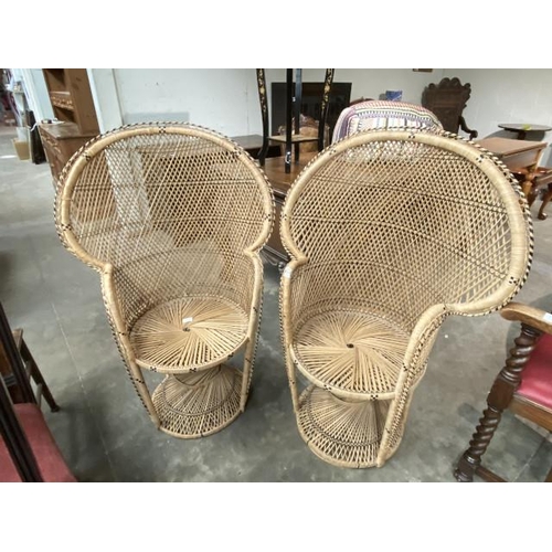 80 - 2 wicker 'Peacock' chairs 112H 78W 48D