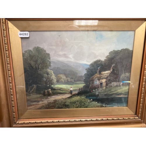 281 - Two antique gilt framed thatch cottage/ landscape scene oil paintings signed W.L 44x37cm (Some minor... 