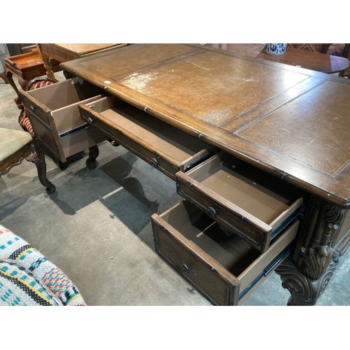 122 - Continental fruitwood kneehole desk 80H 184W 92D and a matching desk chair (as found)