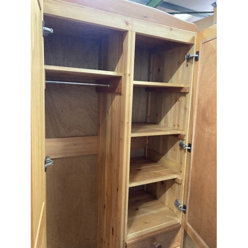 79 - Pine 2 door/3 drawer wardrobe with hanging rail and shelves to the interior 205H 100W 54D