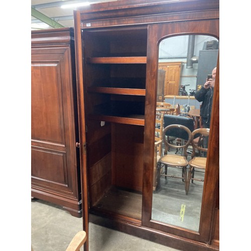 167 - Victorian mahogany triple wardrobe with hanging rail and sliding drawers to the interior 210H 190W 6... 