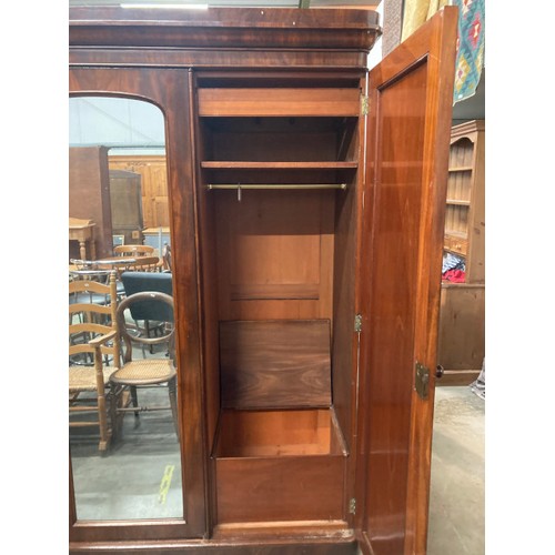 167 - Victorian mahogany triple wardrobe with hanging rail and sliding drawers to the interior 210H 190W 6... 