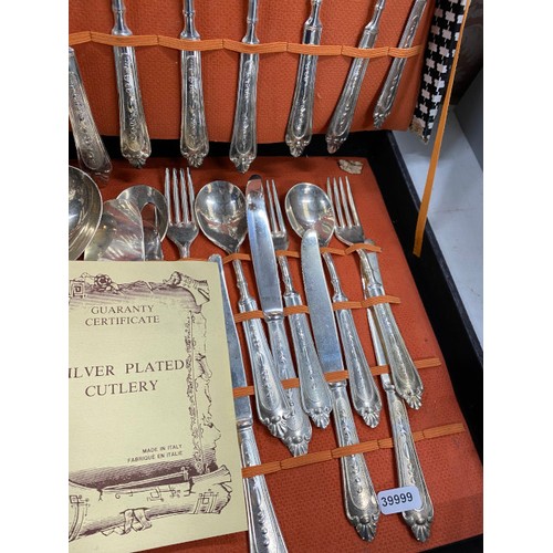 518 - Boxed Edinburgh Crystal decanter and a boxed set of Italian silver plated cutlery (64 pieces, box as... 