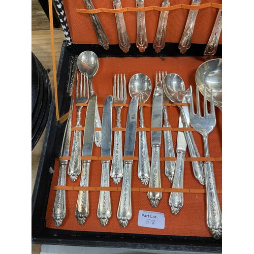 518 - Boxed Edinburgh Crystal decanter and a boxed set of Italian silver plated cutlery (64 pieces, box as... 