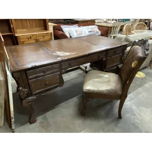 149 - Continental fruitwood kneehole desk 80H 184W 92D and a matching desk chair (as found)