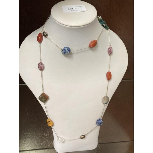 373 - Harlequin polished hard stone necklace 90cm long