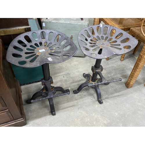 46 - 2 cast metal tractor seat barstools 60H 46W 37D