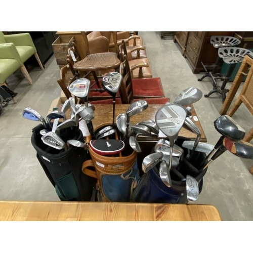 54 - 3 golf bags and clubs including Dunlop, Trilogy etc