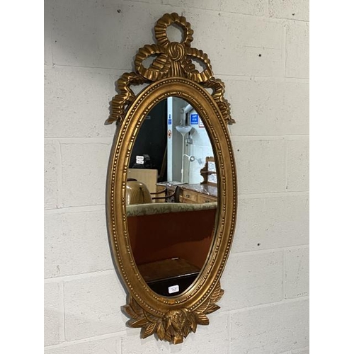 79 - Gilt framed oval wall mirror 118H 50W