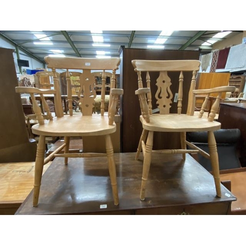 29 - Pair of pine carver chairs