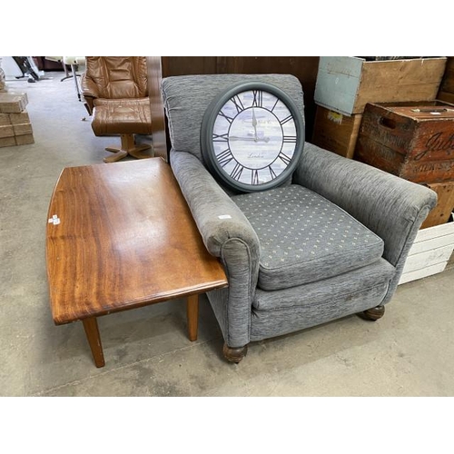 79 - Blue chenille upholstered lounge chair 90W, Greenwood Clock Co clock and a teak coffee table 48H 99W... 