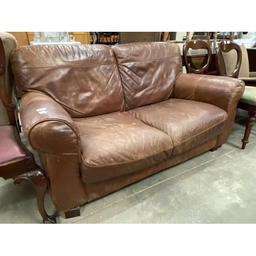 83 - Contemporary distressed tan leather settee 85H 160W 90D