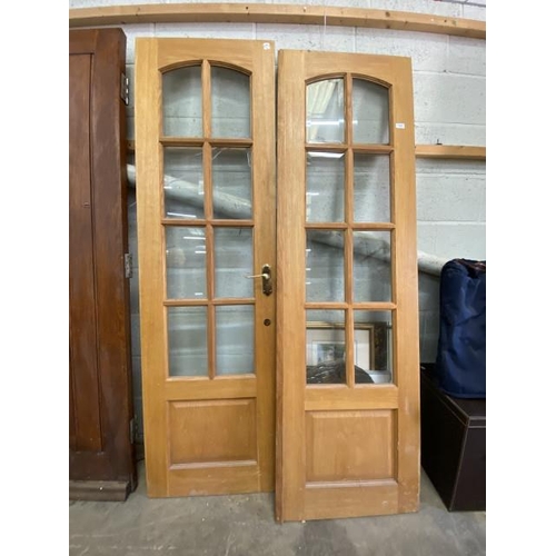 13 - Pair of oak glazed internal doors with brass door furniture 1970H 580W 35D (mm)