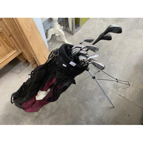 6 - Golf bag and assorted clubs including Wilson