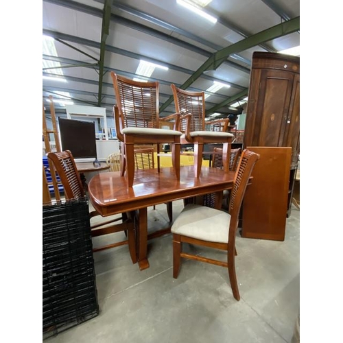 72 - Indonesian teak extending dining table with one leaf 76H 162-208W 105D and 6 chairs (one seat pad mi... 