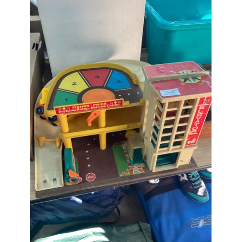 553 - Vintage toy collection including Fisher Price garage with elevator, Fisher Price Airport both with a... 