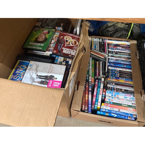 567 - Boxes of DVDs including Paddington, Dr Who, La La Land, Twister etc and boxes of assorted glass ware... 