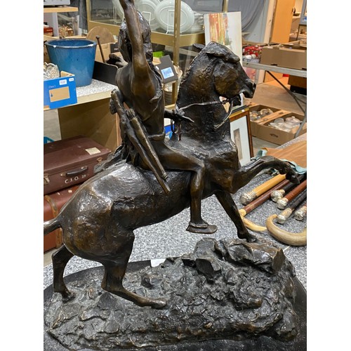 239 - The Wounded Bighorn by Frederic Remington bronze sculpture on granite base, signed to base 50W 61H 2... 