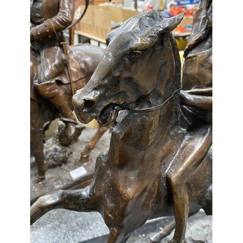 239 - The Wounded Bighorn by Frederic Remington bronze sculpture on granite base, signed to base 50W 61H 2... 