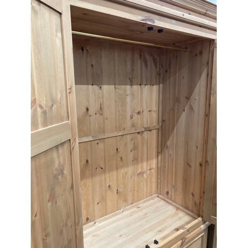 85 - Pine two door/two drawer wardrobe with hanging rail to the interior 200H 126W 58D